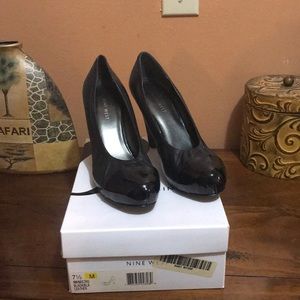 Nine West Black Leather Heels with Patent tips.